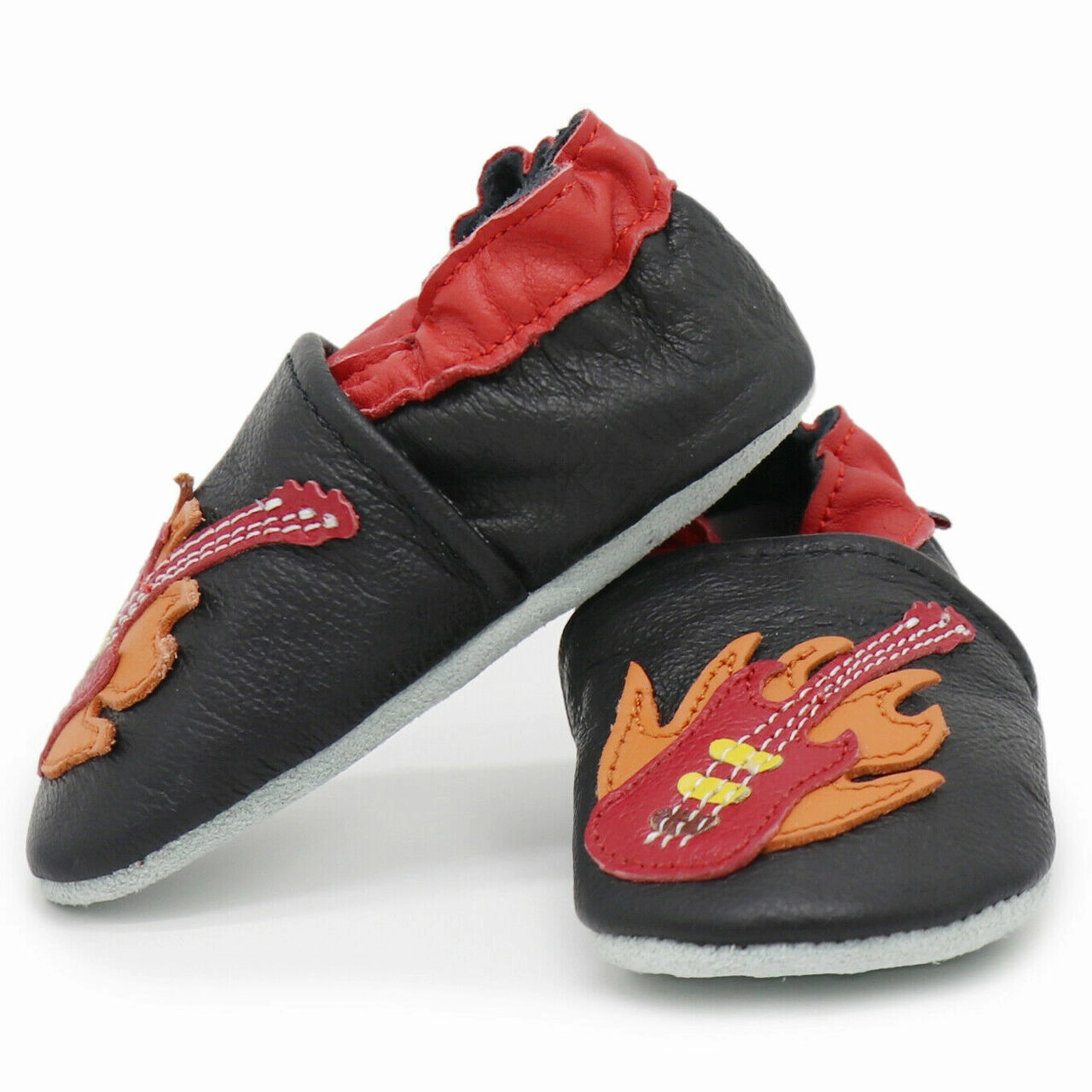 Torsion Adaptive Plate Luxurious Comfort Guitar Black up to 8 Years Old